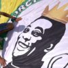 Mourners gather in Santos as Pele is laid to rest