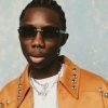 Nigerian rapper, Blaqbonez has claimed that some unnamed music figures are threatening his life.