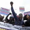 PROTESTERS STORM ENUGU GOVERNMENT HOUSE DEMANDING JUSTICE FOR SHOT YOUTH ‘STONE’